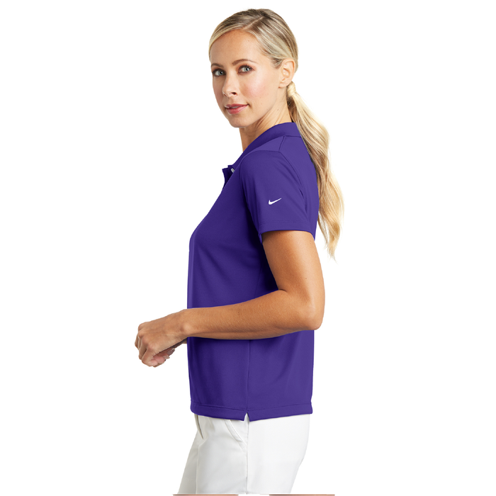 Close-up of Nike Swoosh on ladies tech polo sleeve